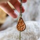 Collier pendentif en cuir patte d'ours