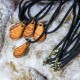 Collier pendentif en cuir patte avant d'ours